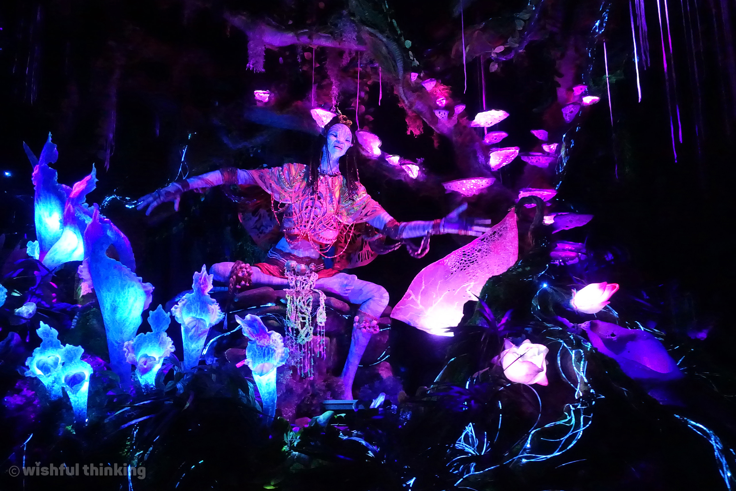 A shaman audio-animatronic delights guests within the Na'vi River Journey in Pandora, the World of Avatar at Disney's Animal Kingdom at Walt Disney World in Orlando, Florida