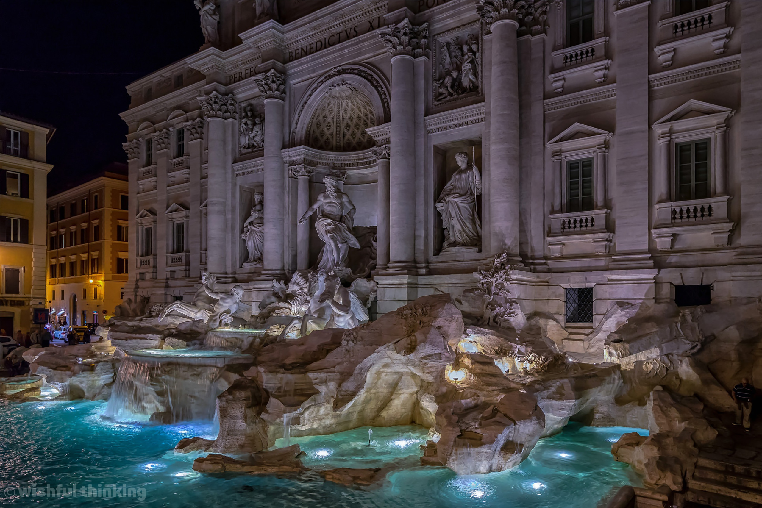 Trevi Fountain in Rome, where cascading waterfalls flow over classical marble sculptures, invite visitors to toss coins in wishful hopes of finding love in Rome