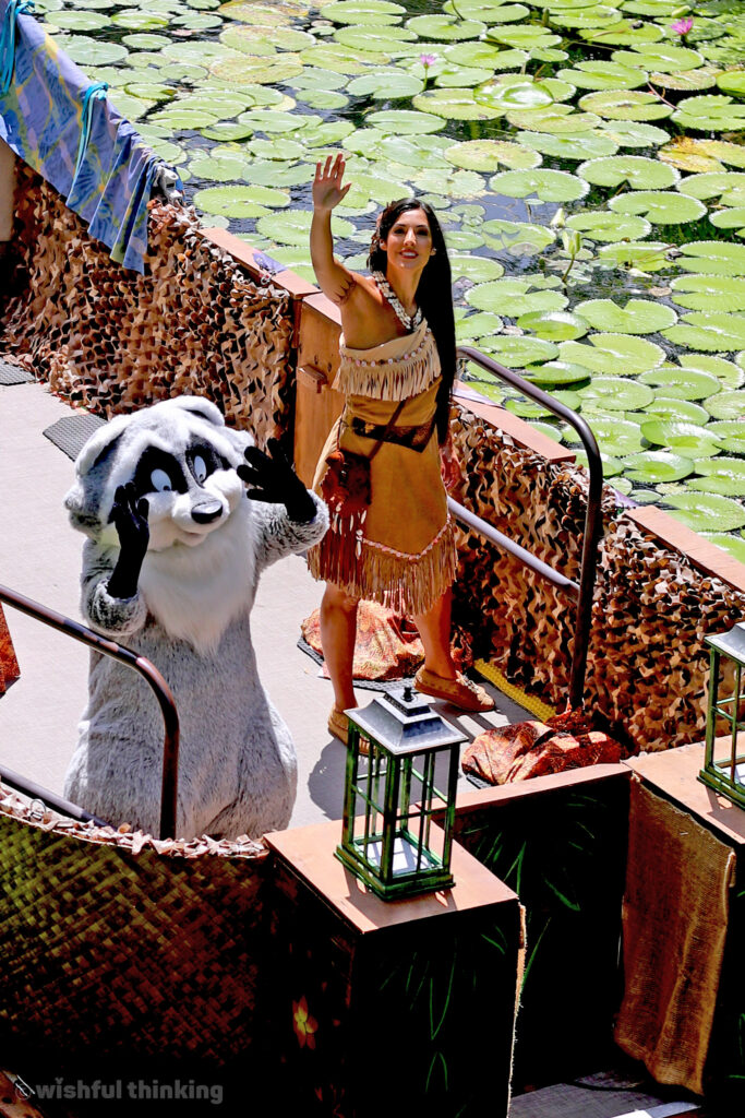 Pocohontas and Meeko wave to guests along the Discovery River at Disney's Animal Kingdom in Walt Disney World in 2020
