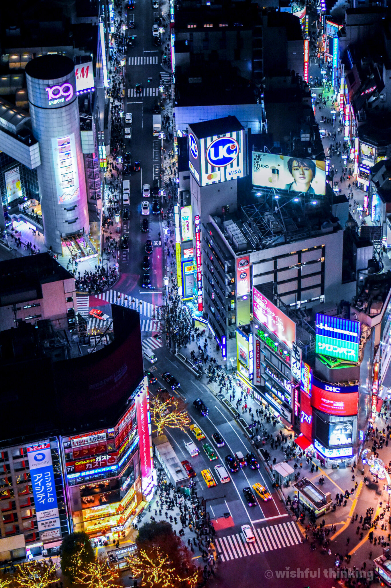 Shibuya's crowded and exciting streets glow with buzzy excitement in Tokyo, Japan