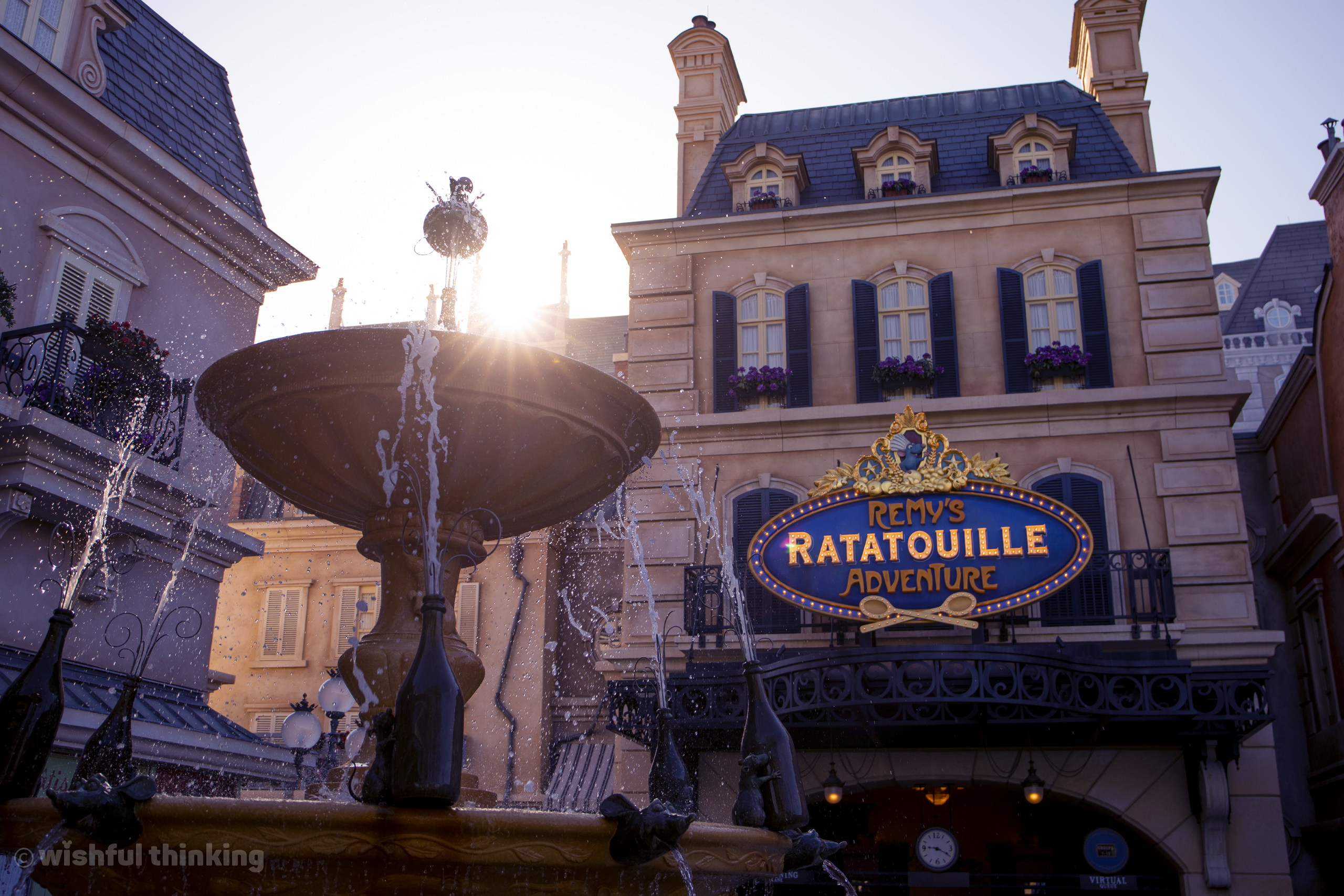 Remy's Ratatouille Adventure glows with morning light in the France pavilion at EPCOT