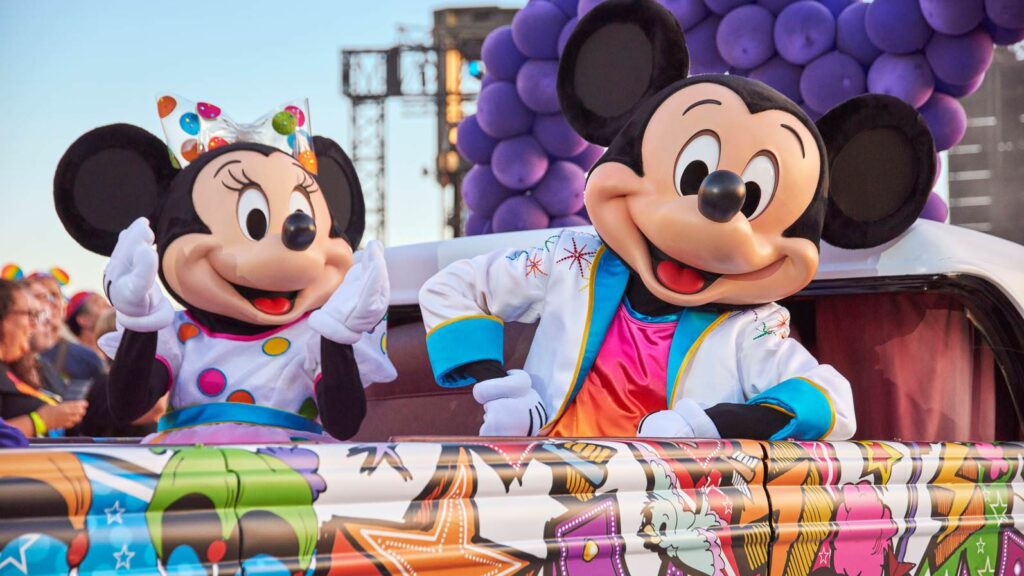 Mickey Mouse and Minnie Mouse welcome guests to Magical Pride at Disneyland Paris