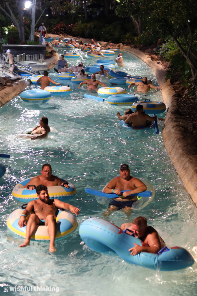 During the Gay Days annual party Riptide at Typhoon Lagoon, party goers float through a lazy river and laugh