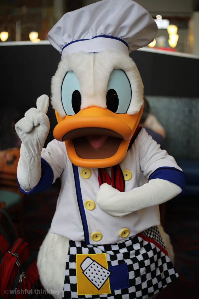 At Chef Mickey's in Disney's Contemporary Resort hotel, Donald Duck in a chef hat asserts his superiority
