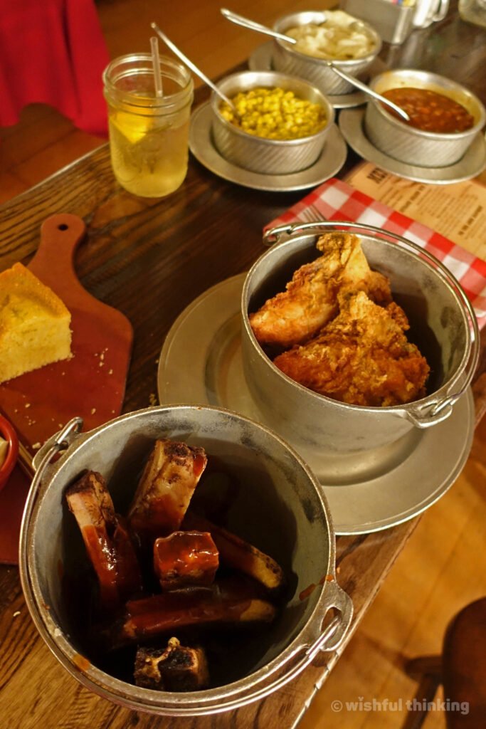 Tasty vittles and homemade grub tempts diners at Disney's Hoop-Dee-Doo Musical Revue, including ribs, corn, fried chicken and corn bread