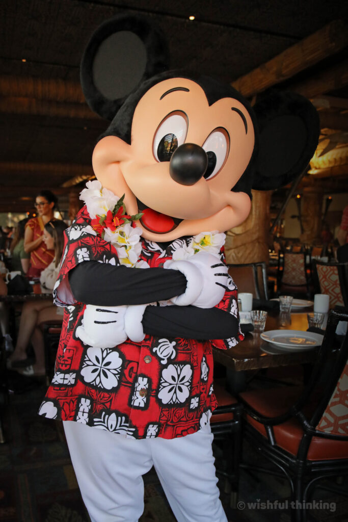 Mickey Mouse himself warmly poses for diners at 'Ohana restaurant in Disney's Polynesian Village Resort