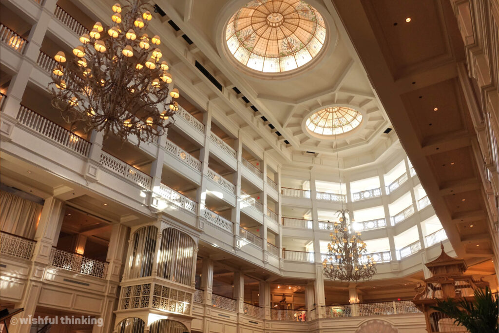 The sunlit lobby of Disney's Grand Floridian Resort & Spa welcomes guests at Walt Disney World in Orlando, Florida